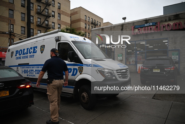 One person is being killed and one person is being injured in a stabbing inside a laundromat in Bronx, New York, United States, on August 8,...