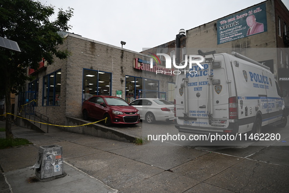 One person is being killed and one person is being injured in a stabbing inside a laundromat in Bronx, New York, United States, on August 8,...