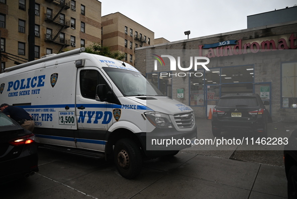 One person is being killed and one person is being injured in a stabbing inside a laundromat in Bronx, New York, United States, on August 8,...