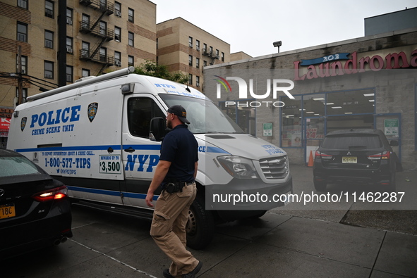 One person is being killed and one person is being injured in a stabbing inside a laundromat in Bronx, New York, United States, on August 8,...