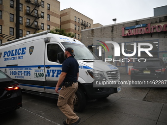 One person is being killed and one person is being injured in a stabbing inside a laundromat in Bronx, New York, United States, on August 8,...