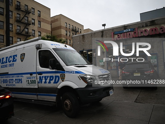 One person is being killed and one person is being injured in a stabbing inside a laundromat in Bronx, New York, United States, on August 8,...