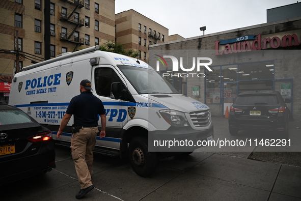 One person is being killed and one person is being injured in a stabbing inside a laundromat in Bronx, New York, United States, on August 8,...