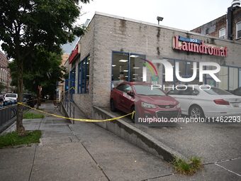 One person is being killed and one person is being injured in a stabbing inside a laundromat in Bronx, New York, United States, on August 8,...