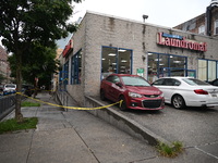 One person is being killed and one person is being injured in a stabbing inside a laundromat in Bronx, New York, United States, on August 8,...