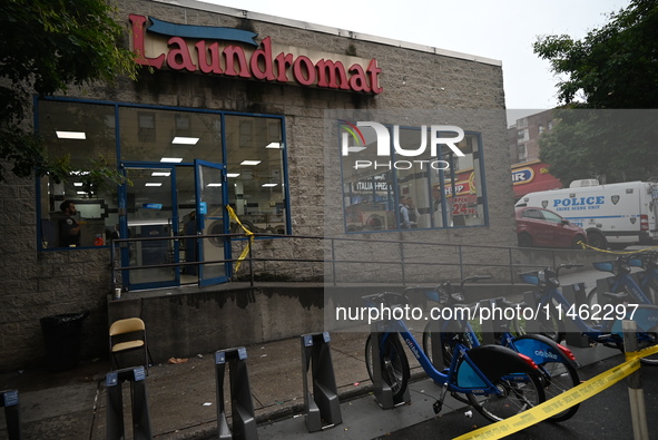 One person is being killed and one person is being injured in a stabbing inside a laundromat in Bronx, New York, United States, on August 8,...