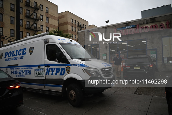 One person is being killed and one person is being injured in a stabbing inside a laundromat in Bronx, New York, United States, on August 8,...