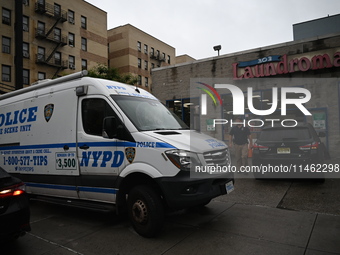 One person is being killed and one person is being injured in a stabbing inside a laundromat in Bronx, New York, United States, on August 8,...