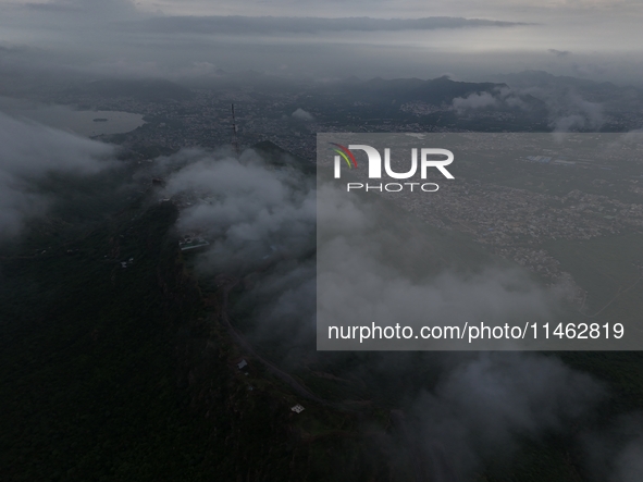 Clouds Hover Over The Mountains During The Monsoon Rain Season In Ajmer, India On 08 August 2024.