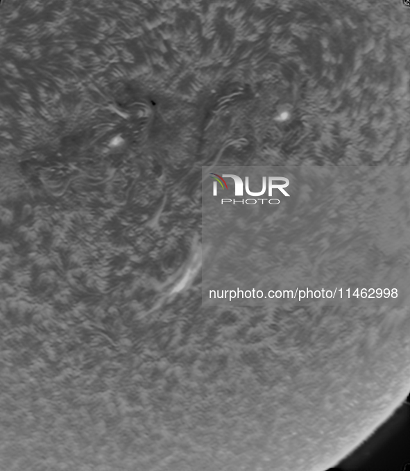 (EDITOR'S NOTE: This image was captured with an H-Alpha solar telescope and is the result of stacking the best 20% of frames. The final stac...