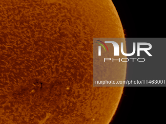 (EDITOR'S NOTE: This image was captured with an H-Alpha solar telescope and is the result of stacking the best 20% of frames. The final stac...