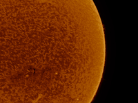 (EDITOR'S NOTE: This image was captured with an H-Alpha solar telescope and is the result of stacking the best 20% of frames. The final stac...