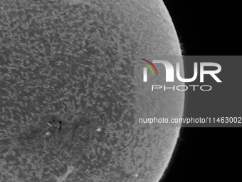 (EDITOR'S NOTE: This image was captured with an H-Alpha solar telescope and is the result of stacking the best 20% of frames. The final stac...