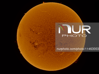 (EDITOR'S NOTE: This image was captured with an H-Alpha solar telescope and is the result of stacking the best 20% of frames. The final stac...