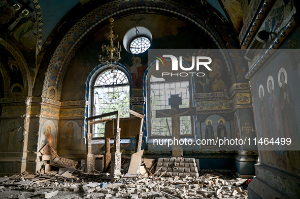 The interior of the Church of the Nativity of the Blessed Virgin Mary is being damaged by the Russian shelling in Novoekonomichne, Ukraine,...