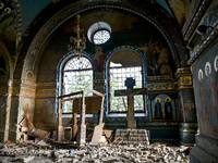 The interior of the Church of the Nativity of the Blessed Virgin Mary is being damaged by the Russian shelling in Novoekonomichne, Ukraine,...