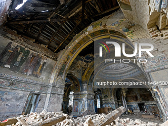 The interior of the Church of the Nativity of the Blessed Virgin Mary is being damaged by the Russian shelling in Novoekonomichne, Ukraine,...