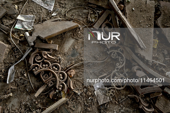 Broken pieces of decorations are covering the floor at the Church of the Nativity of the Blessed Virgin Mary, damaged by the Russian shellin...