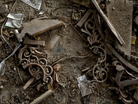 Broken pieces of decorations are covering the floor at the Church of the Nativity of the Blessed Virgin Mary, damaged by the Russian shellin...