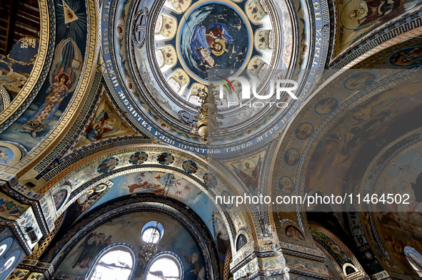 The interior of the Church of the Nativity of the Blessed Virgin Mary is being damaged by the Russian shelling in Novoekonomichne, Ukraine,...