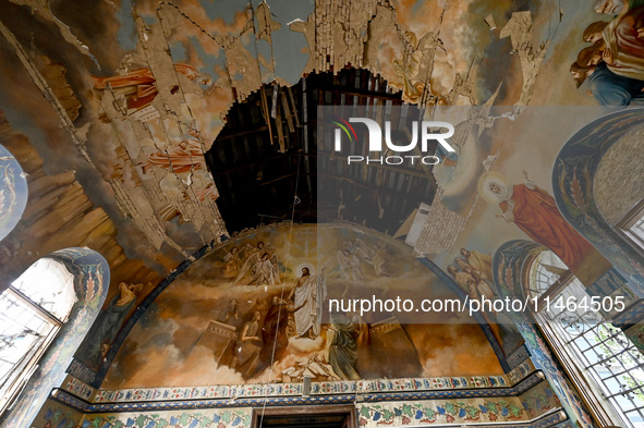 The interior of the Church of the Nativity of the Blessed Virgin Mary is being damaged by the Russian shelling in Novoekonomichne, Ukraine,...