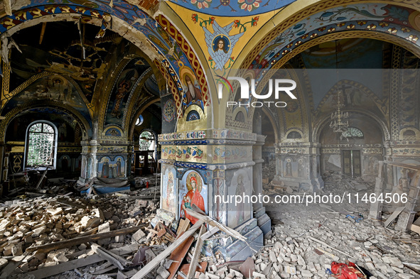 The interior of the Church of the Nativity of the Blessed Virgin Mary is being damaged by the Russian shelling in Novoekonomichne, Ukraine,...