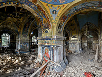 The interior of the Church of the Nativity of the Blessed Virgin Mary is being damaged by the Russian shelling in Novoekonomichne, Ukraine,...