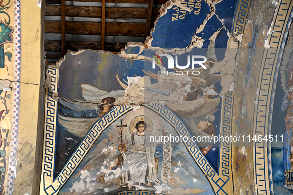 The interior of the Church of the Nativity of the Blessed Virgin Mary is being damaged by the Russian shelling in Novoekonomichne, Ukraine,...