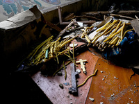 Crosses and wax candles are at the Church of the Nativity of the Blessed Virgin Mary, which is damaged by the Russian shelling on July 8, in...