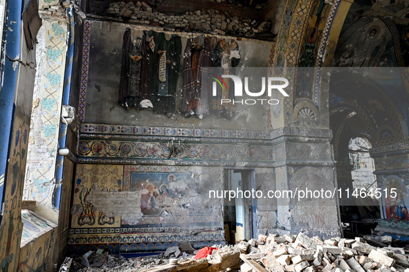 The interior of the Church of the Nativity of the Blessed Virgin Mary is being damaged by the Russian shelling in Novoekonomichne, Ukraine,...