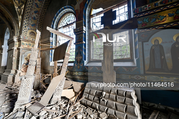 The interior of the Church of the Nativity of the Blessed Virgin Mary is being damaged by the Russian shelling in Novoekonomichne, Ukraine,...