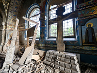 The interior of the Church of the Nativity of the Blessed Virgin Mary is being damaged by the Russian shelling in Novoekonomichne, Ukraine,...