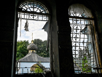 Broken windows are at the Church of the Nativity of the Blessed Virgin Mary, damaged by the Russian shelling on July 8, in Novoekonomichne,...