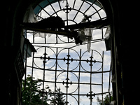 A broken window is at the Church of the Nativity of the Blessed Virgin Mary, damaged by the Russian shelling in Novoekonomichne, Ukraine, on...