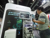 Visitors are experiencing ''Gastrointestinal endoscopy'' at the 30th China International Medical Instruments and Equipment Exhibition in Bei...