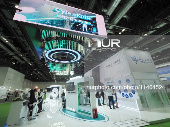 Visitors are visiting the booth of ''Sinonuclear Ankerui'' at the 30th China International Medical Instruments and Equipment Exhibition in B...