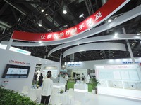 Visitors are visiting the ''Proton Therapy System'' at the 30th China International Medical Instruments and Equipment Exhibition in Beijing,...