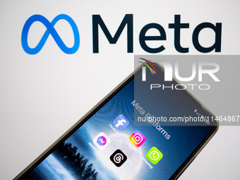 Meta platforms are being displayed on a smartphone screen, and the Meta logo is appearing in the background in Chania, Greece, on August 9,...