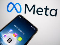 Meta platforms are being displayed on a smartphone screen, and the Meta logo is appearing in the background in Chania, Greece, on August 9,...