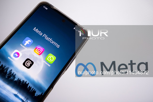 Meta platforms are being displayed on a smartphone screen, and the Meta logo is appearing in the background in Chania, Greece, on August 9,...