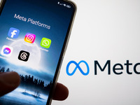 Meta platforms are being displayed on a smartphone screen, and the Meta logo is appearing in the background in Chania, Greece, on August 9,...