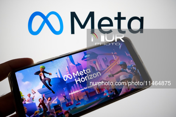 The Meta Horizon Worlds is being displayed on a smartphone screen, and the Meta logo is in the background in Chania, Greece, on August 9, 20...