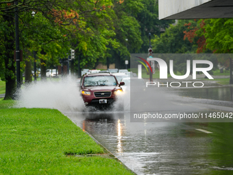 Roads along the Potomac River in Washington, D.C., were flooded due to Tropical Storm Debby on August 9, 2024 (