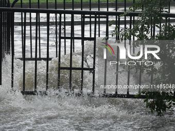 Roads along the Potomac River in Washington, D.C., were flooded due to Tropical Storm Debby on August 9, 2024 (