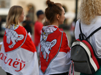 KRAKOW, POLAND - AUGUST 9:
Members of the Belarusian diaspora, many displaying white-red-white opposition flags, gather at Krakow's Market S...