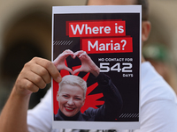 KRAKOW, POLAND - AUGUST 9:
A member of the Belarusian diaspora holds a poster with the inscription 'Where is Maria? No contact for 542 days,...