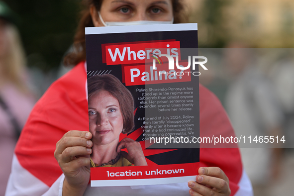 KRAKOW, POLAND - AUGUST 9:
A member of the Belarusian diaspora holds a poster with the inscription 'Where is Palina? Location unknown,' feat...