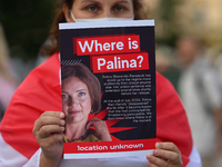 KRAKOW, POLAND - AUGUST 9:
A member of the Belarusian diaspora holds a poster with the inscription 'Where is Palina? Location unknown,' feat...