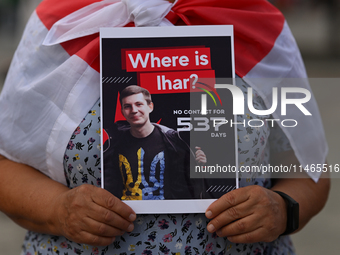 KRAKOW, POLAND - AUGUST 9:
A member of the Belarusian diaspora holds a poster with the inscription 'Where is Ihar? No contact for 537 days,'...