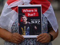 KRAKOW, POLAND - AUGUST 9:
A member of the Belarusian diaspora holds a poster with the inscription 'Where is Ihar? No contact for 537 days,'...